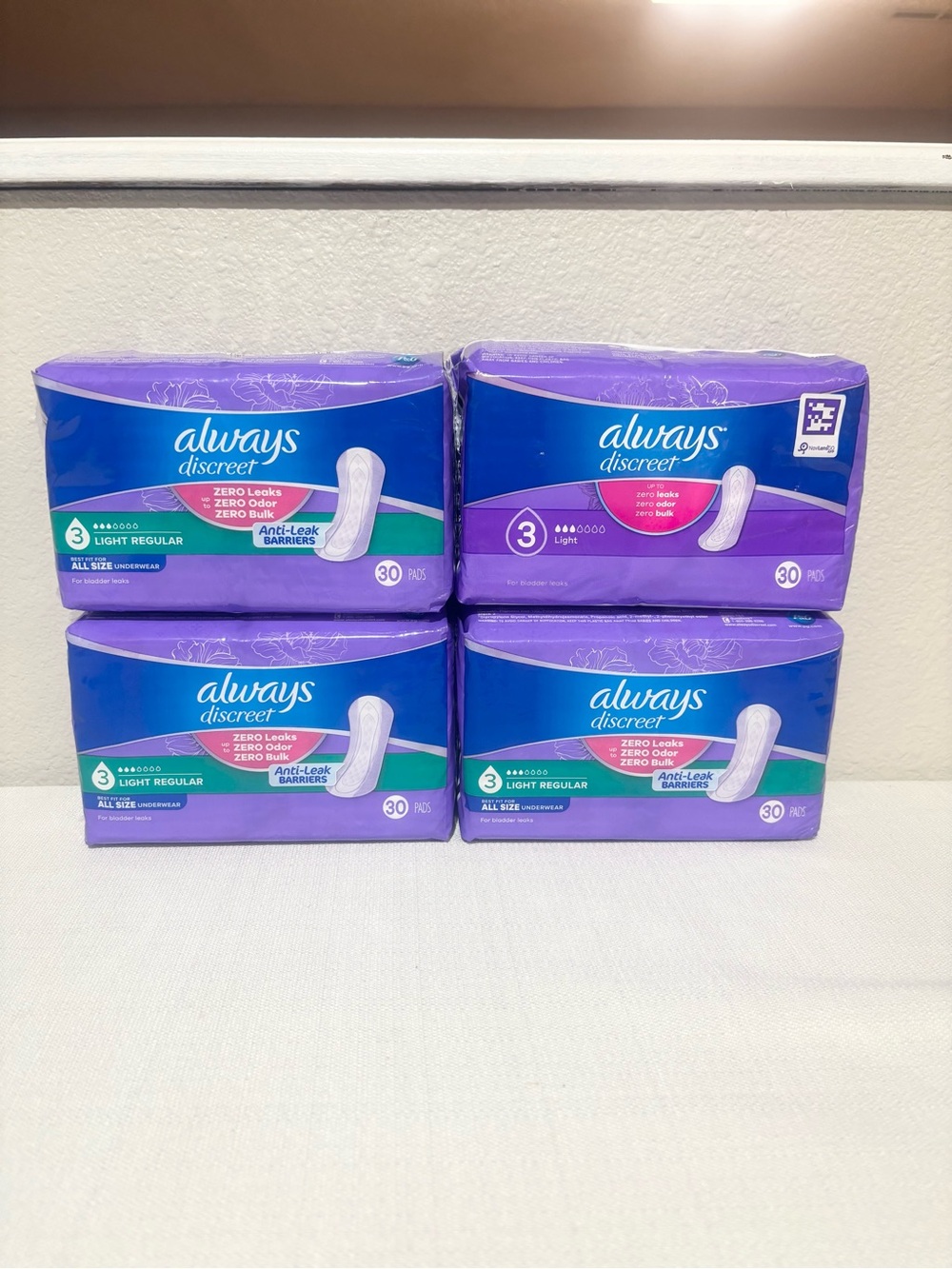 Always Discreet Light Regular/light Pads - Purple and Teal Packaging (4 Packs)